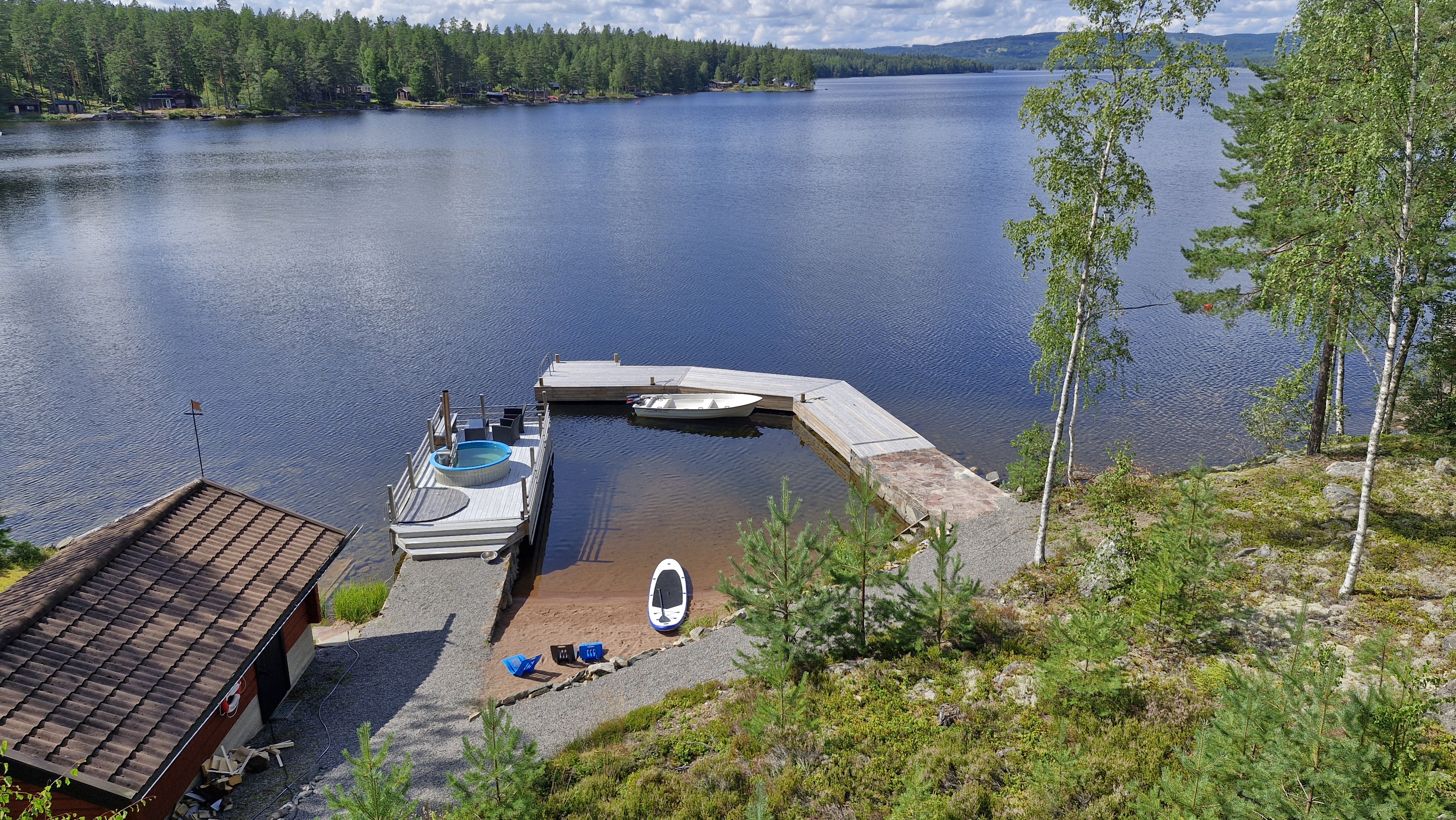 Private sandy beach and jetty