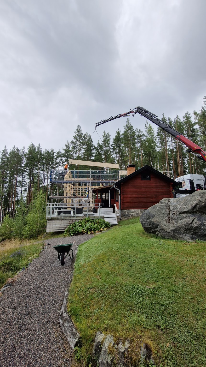 A beam is lifted into place.